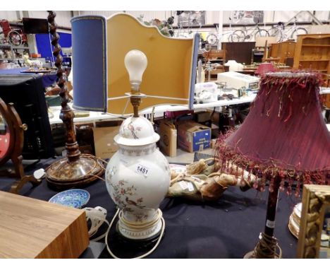 Large floral lamp with blue shade. All electrical items in this lot have been PAT tested for safety and have passed. This doe