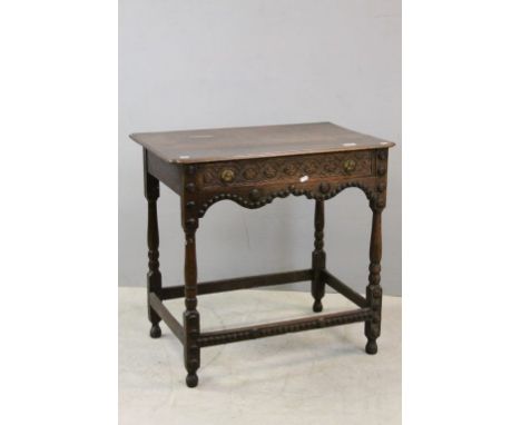 Oak Side Table, the frieze drawer with later decoration and applied ' button ' mouldings, 74cms wide