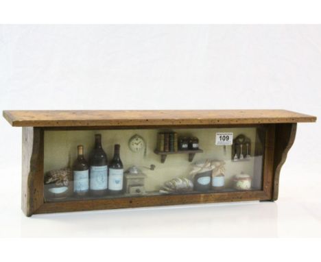 Wooden Shelf containing a Diorama of a Kitchen Scene