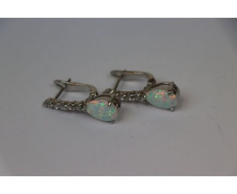 Pair of silver and pear shaped opal earrings 