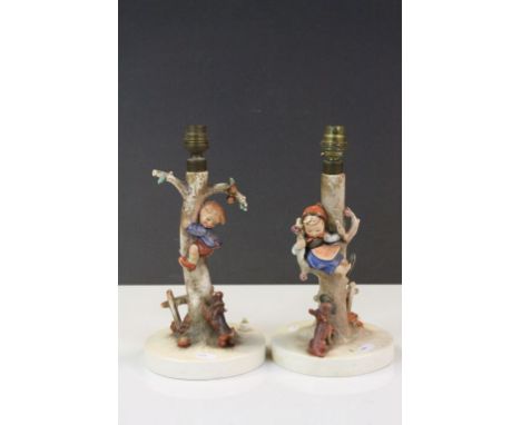 Pair of vintage Hummel ceramic Lamps both approx 29cm tall including fittings and marked "W Goebel" to base, one with a Boy c