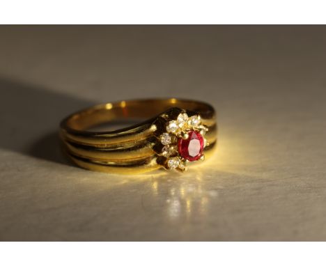 A Small Ruby and Diamond Cluster Ring,&nbsp; Mounted in 18 ct yellow gold 3.07g, size M-N&nbsp;