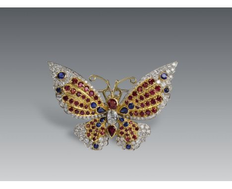 A Pretty Diamond, Ruby and Sapphire Butterfly Brooch,finely mounted in 18 carat gold and platinum,W:5.5cm.,approx weight 26.7
