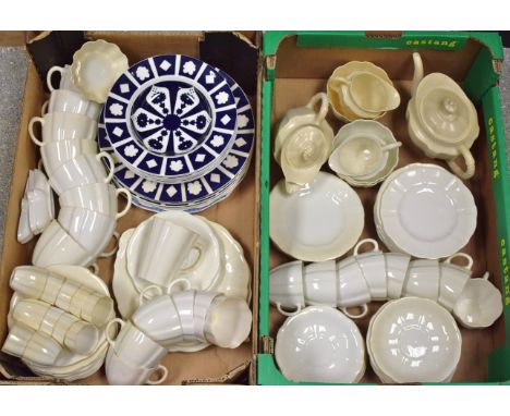 A Royal Crown Derby utility white ware tea service for fourteen comprising tea pot, hot water jug, bread plates, side plates,