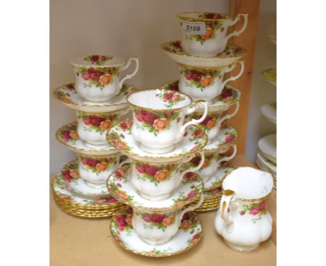 A Royal Albert Old Country Roses tea service for ten comprising tea plates, cream jug, cup and saucers