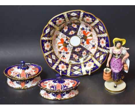 A Derby model of a dairy maid, early 19th century, Kings Street marks; a Royal Crown Derby 2451 Traditional Imari pattern sha