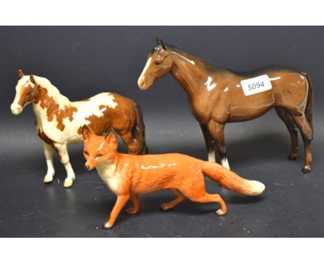 A Beswick model of fox, gloss finish; another of brown mare; another speckled, faults (3)