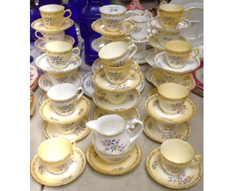 A Royal Grafton floral tea service comprising bread plate, side plates, sugar basin, cream jug, cups and saucers;  quantity