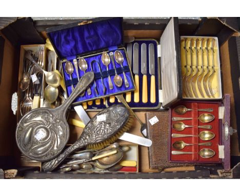 A part silver dressing table set, Birmingham;  a silver dessert spoon, London;  a plated set of teaspoons and sugar tongues, 