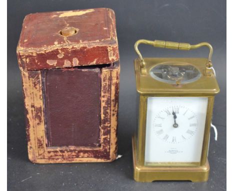 A 19th century quarter repeating brass carriage clock, white dial, marked Exam by Webster, 5 Queen Victoria Street London, Ro