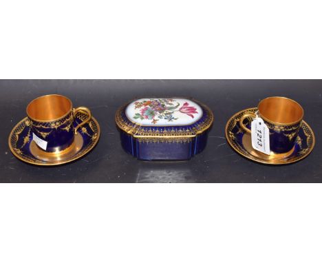 A Limoges floral trinket box; Limoges coffee cans and saucers