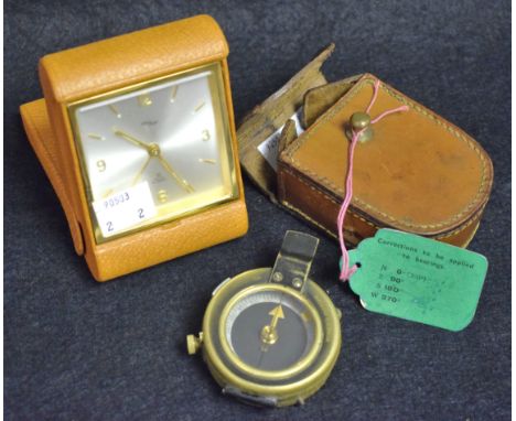 A WWI leather cased compass; an IMHOF Art Deco travel clock (2)