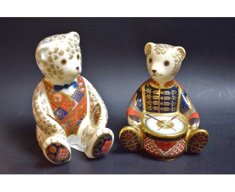 A Royal Crown Derby paperweight Drummer bear; another; a Teddy bear, silver stoppers (2)