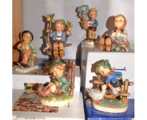 A Goebel Hummel figure Afternoon Nap, Merry Wanderer, Good News, Happy Pastime, Barnyard Hero, Apple Tree Boy, all boxed (6)