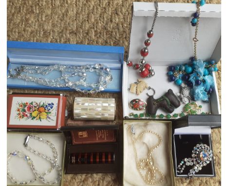 A small quantity of costume jewellery and collectables to include compacts, a vintage German Win lighter, 2 Aurora Borealis n