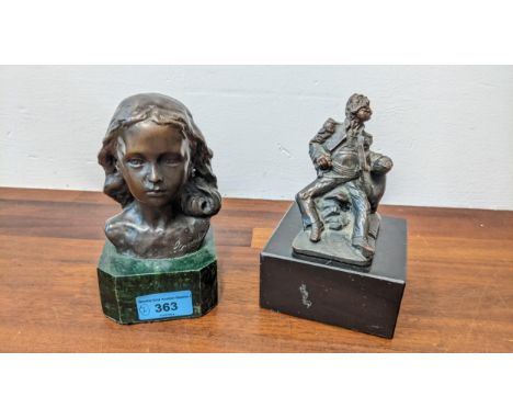 Two bronze finished cast metal figures, a bust of a girl and gentleman in uniform leaning against a barrel, each on a marble 