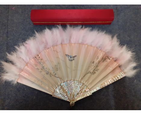 Duvelleroy, Paris-A cream silk fan with pink hues having a hand-painted scene of a bird inflight between floral branches on 1