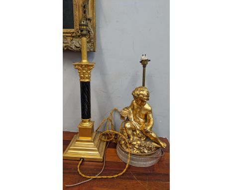 A gilt plaster lamp base in the form of a classical boy, and a gilt metal candlestick style lamp, 50cm hLocation:If there is 