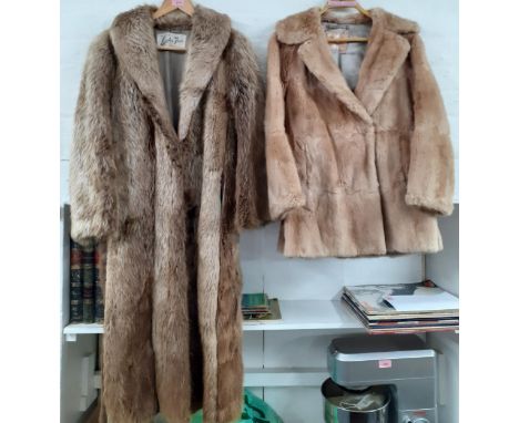 Two vintage furs to include a Brahams Furriers blonde rabbit fur jacket 36" chest. 28" long and a Leader Furs wolf fur coat 3