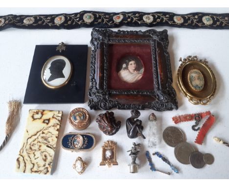 Mixed collectables to include a carved treen netsuke, a small carved model of a seated lady A/F, coins to include British com