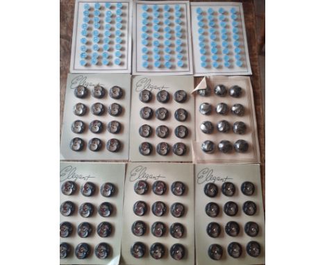 A large quantity of late 19th/early 20th Century shirt/blouse mother of pearl buttons together with 9 cards of mid 30th centu
