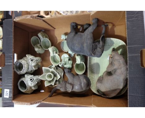 A mixed collection of light green 20th Century pottery elephants and dishes together with 3 large resin figures 