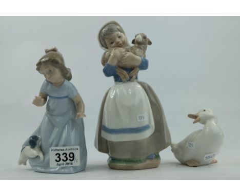 Nao figures of girl holding kid goat, small girl playing with puppy and figure of duckling (3)