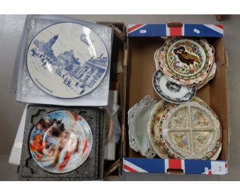 A good collection of continental and English decorative plates, chargers and cake stands (some boxed) including Delft, Zsonay