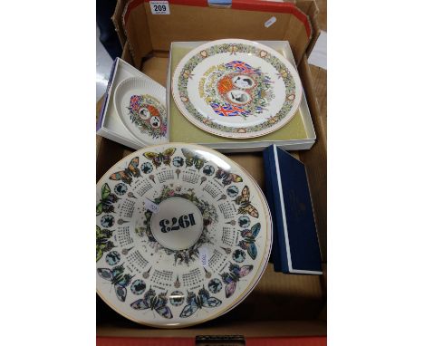 A good collection of Wedgwood items to include calender plates, commemorative plates and a pair of Royal Worcester pin dishes