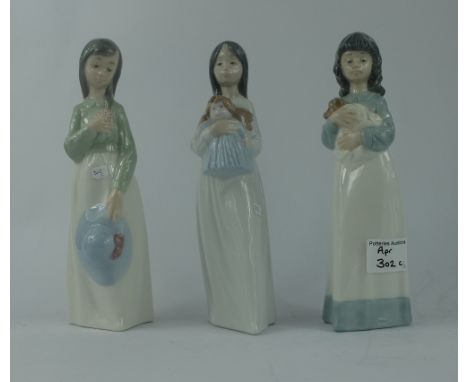 Nao figures of young ladies holding their hat, doll and teddy bear (3)