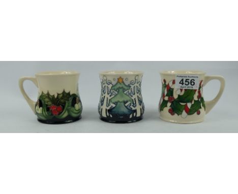 Moorcroft trial mugs with seasonal designs height 8.5cm (3)