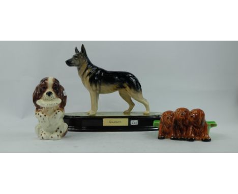 Beswick figure of a comical dog begging with plate 1054, triple puppy dog ashtray 916 and Alsatian on ceramic base (3)