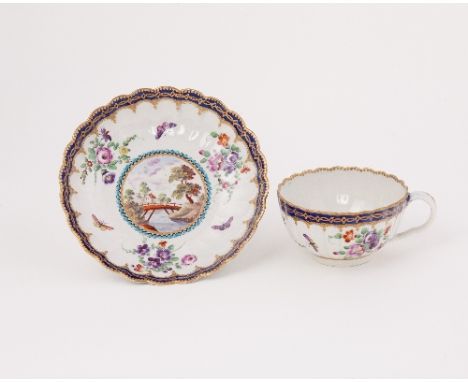 A Worcester teacup and saucer of Lord Henry Thynne type, the ribbed body painted with flowers and landscape panels, circa 177