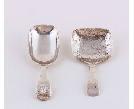 A George IV silver caddy spoon, London 1828, of fiddle and shell pattern and another, Birmingham 1826 of fiddle pattern