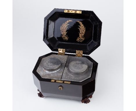 A William IV Anglo-Chinese black lacquer tea caddy, the hinged cover with armorial and painted gilt ferns to the underside, o