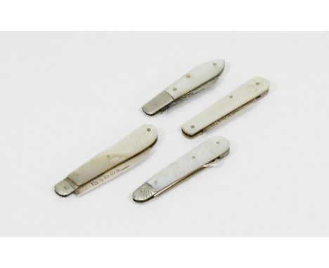 A Victorian penknife with silver blade and mother-of-pearl handle, two later penknives similar and a button hook