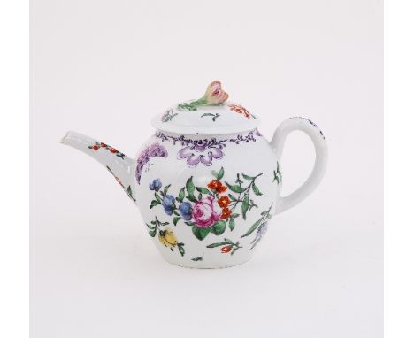 A Worcester teapot and cover, painted with scattered flower sprays and butterflies, the neck and handle with purple shells an