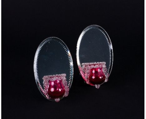 A pair of ruby glass vases with frilled borders and oval mirrored backs, 21cm high Condition Report: Lot 286:
Glass in good c