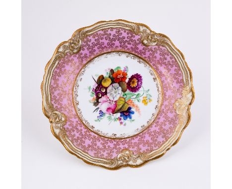 A Chamberlains (Worcester) dessert plate, the central flower spray in a pink and gilt seaweed border, circa 1820, 23.5cm wide