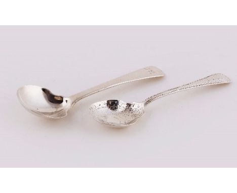 A George IV silver caddy spoon, London 1825, of old English pattern, the terminal initialled M and a Victorian caddy spoon, E