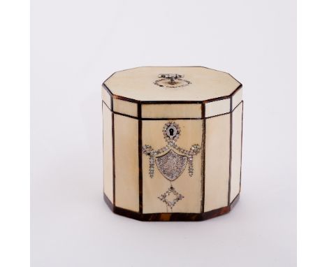 A fine Georgian ivory decagonal tea caddy, banded in tortoiseshell with silver ring handle and oval of mother-of-pearl beads 