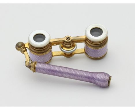 A pair of guilloche enamel and gilt metal opera glasses, with hinged handle, marked 'Flammarion', 10.5cm wide