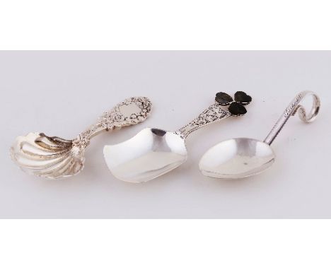 A Victorian silver caddy spoon, J W, Birmingham 1896, with roses to the stem and shell bowl, another caddy spoon, Birmingham 