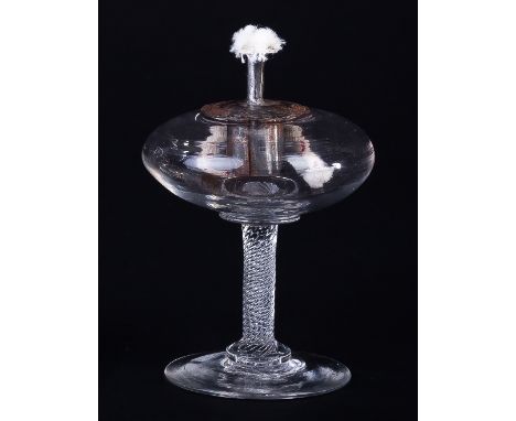 A lacemaker's Georgian lamp with compressed spherical well on a fine spirally ribbed stem and circular base, 9cm high