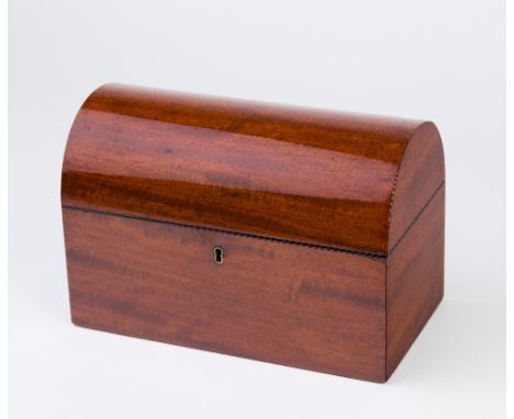 A late 19th Century mahogany dome top tea caddy, the interior fitted two lidded compartments, 26.5cm wide