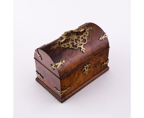 A Victorian walnut tea caddy, with brass mounted dome cover and strapped corners, 14.5cm wide