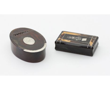 An oval wooden snuff box with monogrammed oval and plated mount to the hinge cover, 9cm wide and a horn snuff box with inlay 