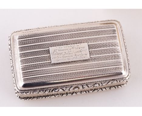 A George IV silver snuff box, Thomas Shaw, Birmingham 1823, with reeded decoration and foliate borders, engraved 'Presented t