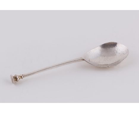 A George I silver seal top spoon, maker's mark illegible, London 1717, the terminal initialled R/RE