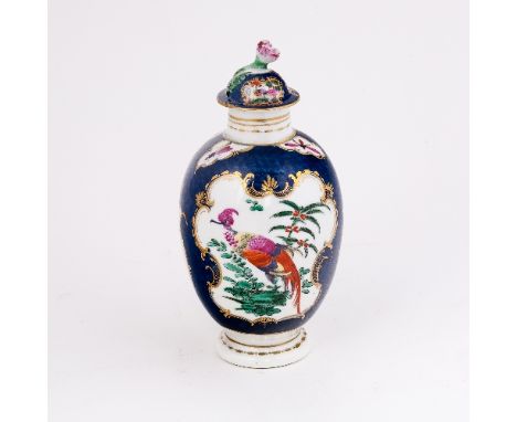 A Worcester blue scale ground tea canister and cover, oviform, painted with opposing panels of exotic birds, circa 1770, hatc